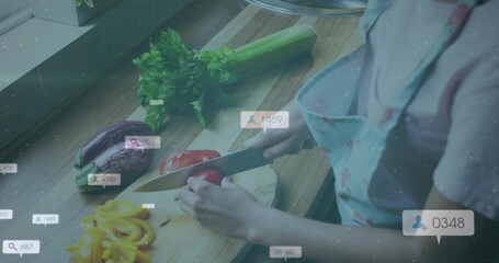 Slicing cook patterned-apron cutting red pepper at home counter, chef knife, UI bubbles, copy space
