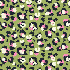 Seamless animal print vector pattern with abstract leopard spots in black, cream, and pink on an olive green background. Stylish modern texture for fashion, fabric, wallpaper, and accessories © incarnadine
