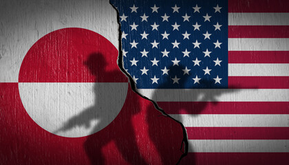 Conceptual image of USA and Greenland flags on a cracked wall with silhouettes of soldiers....