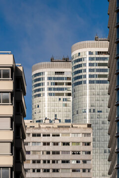 Modern glass tower defines the architecture skyline of business Paris France in La Defense finance district with urban corporate presence and height