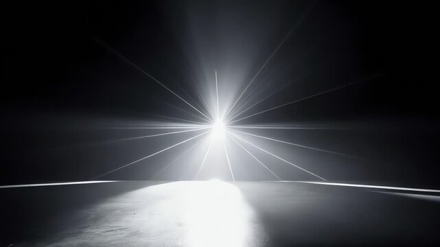 starburst lightbeam on dark stage with reflective floor center glow