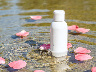 Blank White Cosmetic Bottle Mockup in Water with Ripples