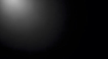 Fototapeta premium Grayscale abstract background with a bright light source illuminating a dark pixelated texture