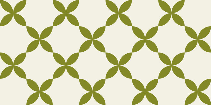 Geometric Moroccan tile pattern with repeating leaf shaped motifs arranged in a clean symmetrical grid.
