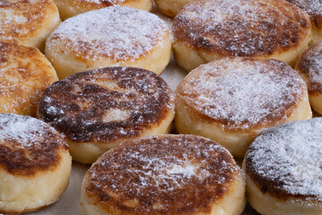 Delicious breakfast treat, Homestyle golden cottage cheese pancake brunch idea, Crispyedged cottage cheese pancakes arranged on sheet pan for comforting family breakfast