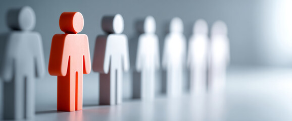 Red wooden figure standing out in a row of blurred white figures symbolizing leadership and individuality in a minimalist setting