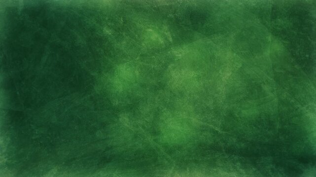 Green textured background with a mottled pattern and varying shades of green on a white surface