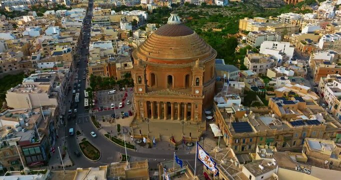 Aerial view of Mosta Church, famous remarkable wartime miracle, architectural landmarks, Malta 