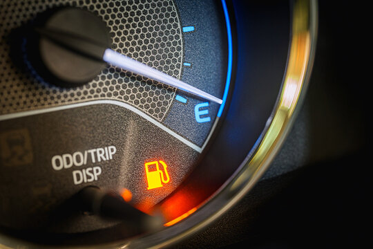 Low Fuel Warning Light on car Dashboard Display