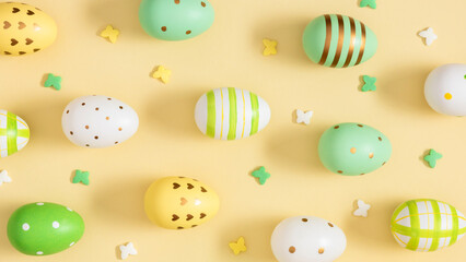 Easter background with decorative eggs on a beige background. Tiny confetti butterflies are scattered across a light yellow background, creating a spring-like, festive composition and the joy of Easte