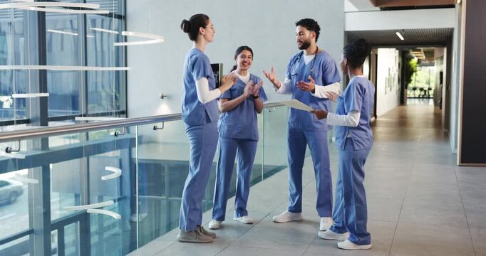 Applause, hand stack and success with medical team in hospital for motivation or support. Clapping, healthcare and huddle with doctors and nurses in hallway of clinic together for collaboration
