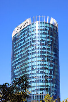 Perth, Western Australia, Australia - February 4 2026: Looking up, Woodside Energy head office building, office block. Global energy company, oil and natural gas. Brand name prominent. Copy space
