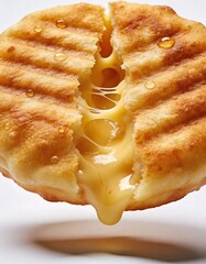 Photorealistic arepa with melted cheese filling, golden crispy surface texture, studio shot, isolated on white background, ultra realistic, no text