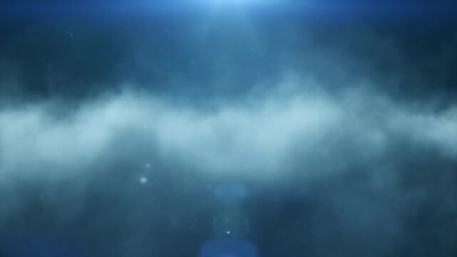 Mysterious blue abstract background with atmospheric fog and lens flare
