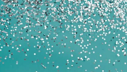 Sparkling silver confetti cascades down a vibrant teal background