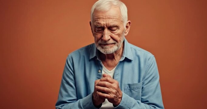 Elderly Man Expressing Guilt and Remorse in Emotional Studio Portrait

