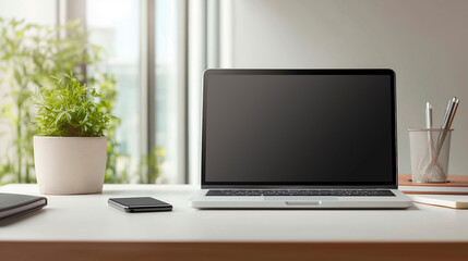 Fototapeta premium Modern workspace with laptop on desk, remote work concept
