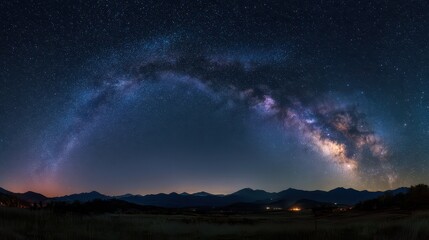 Starry landscape: celestial glow across a dark and quiet heavens