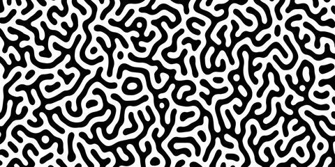Fototapeta premium Abstract black and white pattern of swirling lines and shapes. High contrast turing pattern of black meandering lines on a white background, concept for abstract backgrounds, textile prints,decoration