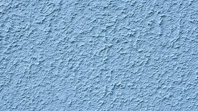 Seamless light blue rough stucco texture background | Exterior house wall plastering texture pattern | Abstract dusty blue cement rendering surface close-up | Coarse architectural backdrop material 