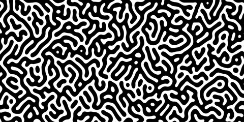 Fototapeta premium Abstract black and white pattern of swirling lines and shapes. High contrast turing pattern of black meandering lines on a white background, concept for abstract backgrounds, textile prints,decoration