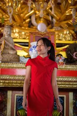 Young Girl in Red Dress Celebrating Chinese New Year Festival