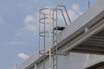 industry metal staircase of the rooftop factory building.