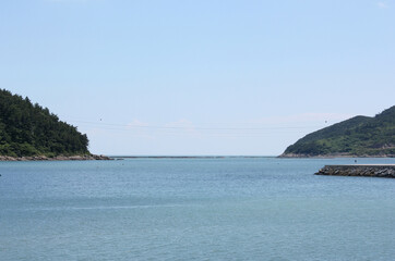 Naklejka premium blue sea in blue sky