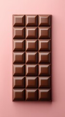 Obraz premium Shiny Milk Chocolate Bar on Pink Background Rectangular Chocolate Blocks Sweet Treat Top Down Close Up Studio Shot