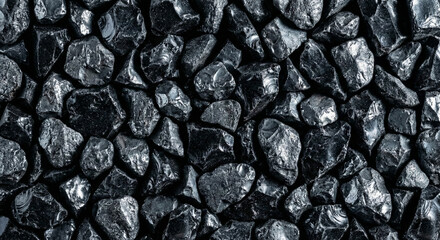 Background of natural polished black stones texture