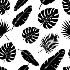Seamless tropical leaf silhouette vector pattern background design