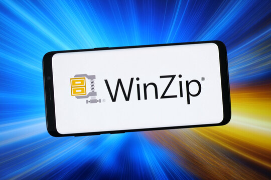 Stuttgart, Germany - 02-04-2026: In this photo illustration, the logo of trialware file archiver software WinZip is displayed on a smartphone in front of abstract background on computer screen.