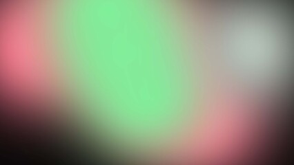 A colorful blurry image with green and pink hues and white spot viewed from a distance in a natural setting as a photograph