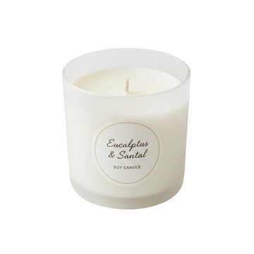Scented soy candle in frosted glass jar