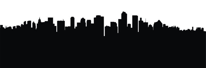 Obraz premium A stark black silhouette of a dense urban cityscape against a white background