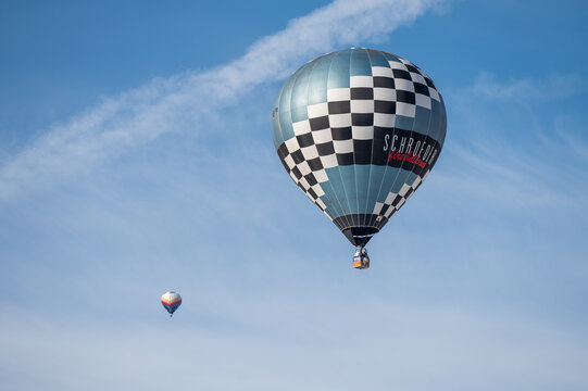 Chateau d'oex, Vaud Canton, Switzerland - 1st February 2026: schroeder fire balloon Flight Over sky in Switzerland Winter.