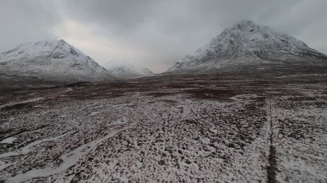 Winter aerial view of Buachaille Etive Mor and road i Glencoe