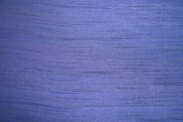 Fototapeta premium Vibrant blue textured fabric background with subtle horizontal lines