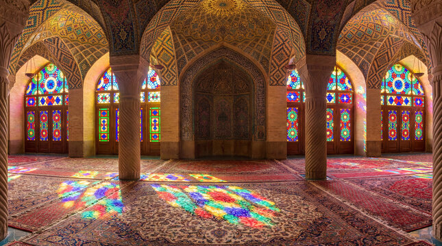 Nasir al-Mulk Mosque Interior Photography: Stained Glass Light Patterns on Prayer Rugs, Ornate Islamic Architecture, Vibrant Colors, Spiritual Ambiance, Travel Destination