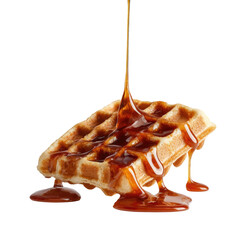Waffle getting syrup drizzled on top, isolated on black background