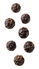 Falling black peppercorns isolated on transparent background
