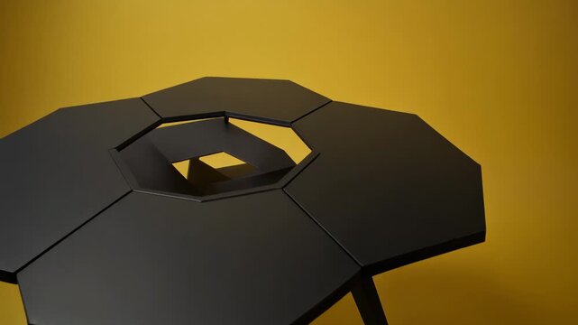 Modern Black Hexagonal Table with Geometric Design on Yellow Background Video