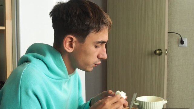 a man has dinner at home after work