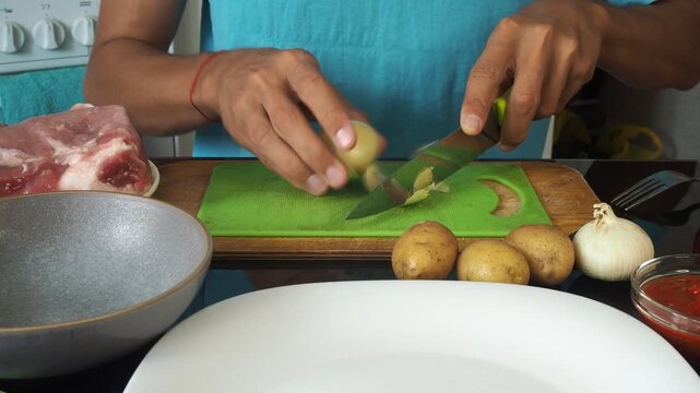 a man cooks dinner after work