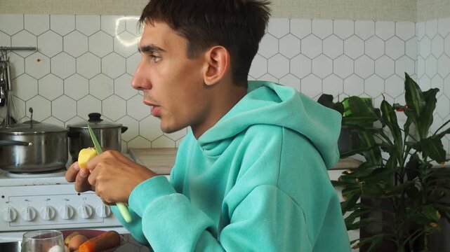 a man has dinner at home after work