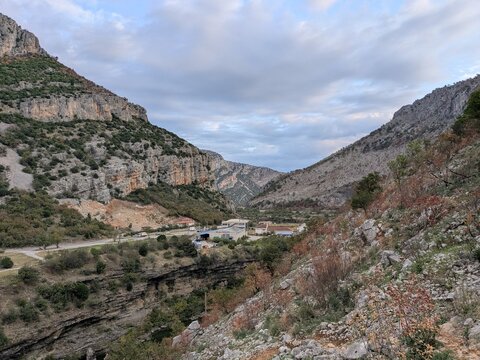 Scenic view of Montenegro mountains and deep canyon valley, showing dramatic rocky relief, pristine nature, and untouched outdoor landscape of the Balkans