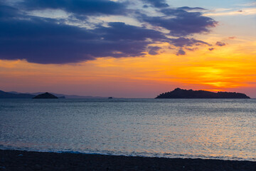 Fototapeta premium Summer sunset on the Greek island of Lesvos, travel background or wallpaper for a catalog