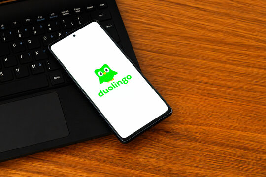 Punta Arenas, Chile &ndash; February 04, 2026: The Duolingo app icon on a mobile phone screen resting on a laptop keyboard