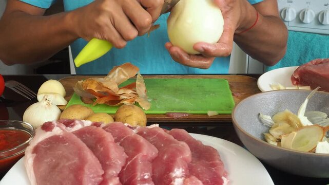 a man cooks dinner after work