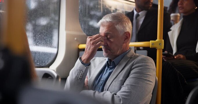 Travel, yawn and mature businessman in bus with winter commute fatigue, crisis or rain risk. Metro, public transport and tired entrepreneur on train sleepy with journey burnout, bored or exhausted